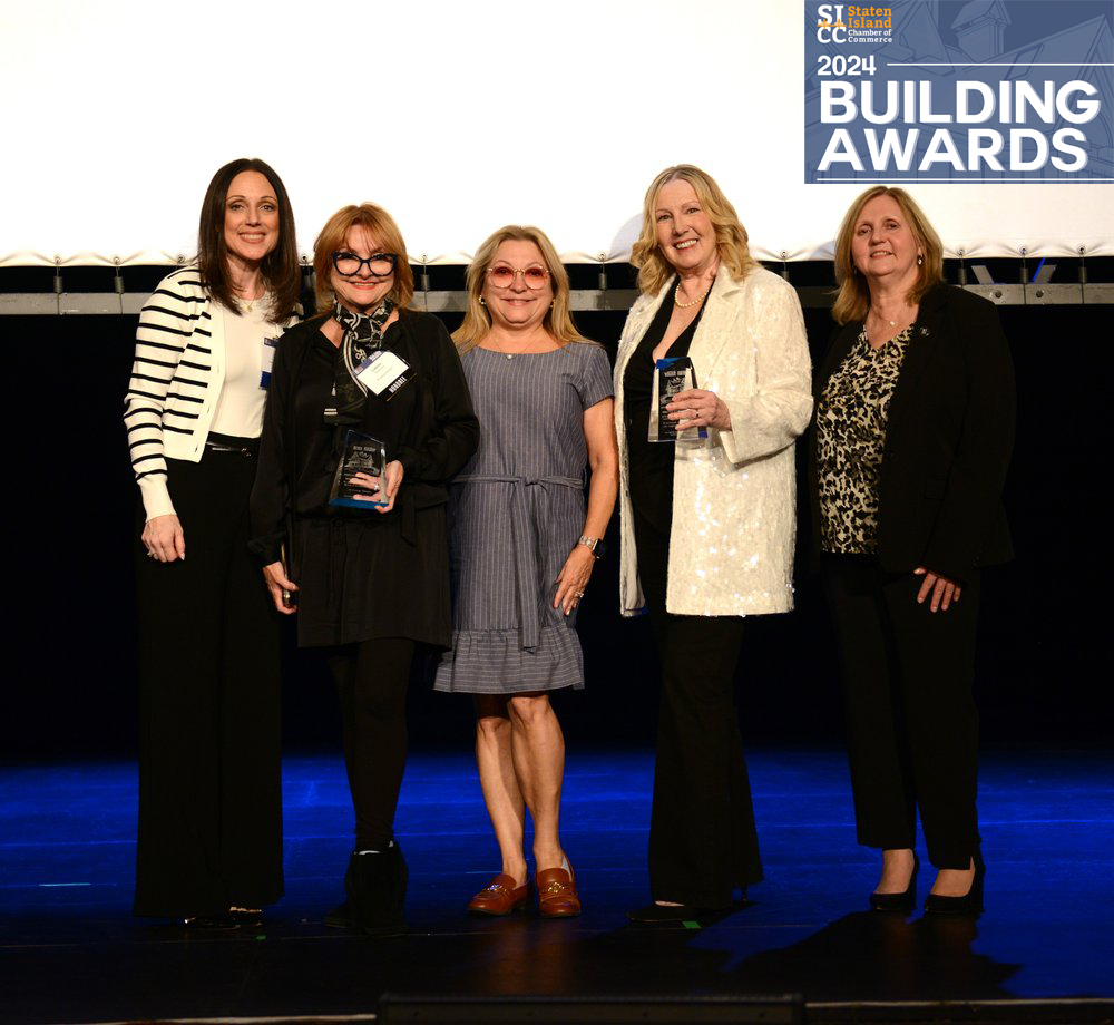 Susan Arann accepting the Staten Island Chamber of Commerce Building Award 2024 for the renovation of the historic St. George Theatre dressing room.