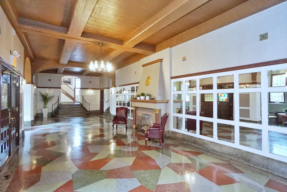 Vintage-inspired restoration showcasing architectural craftsmanship, a grand lobby, and polished historic interiors reflecting Staten Island heritage.