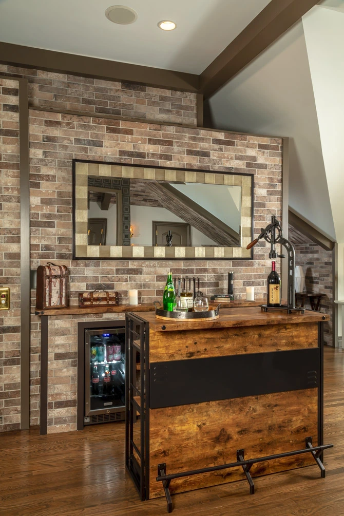 Rustic built-in home bar with a brick accent wall, industrial-style decor, and modern design elements.