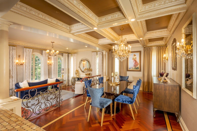 Luxurious interiors with inlaid wood flooring, curved furniture, and opulent details blending bold shapes, rich textures, and functionality.