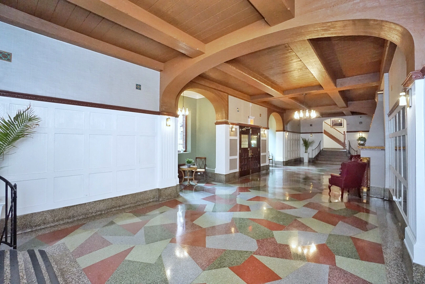 Restored historical preservation lobby in Staten Island, blending classic architectural features with modern elegance.